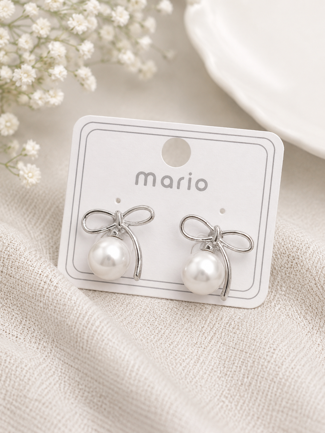 Pearl Bow Grace Stud Earrings